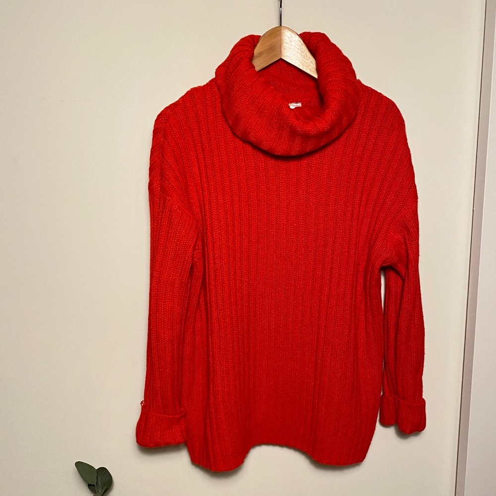 Divided red sweater